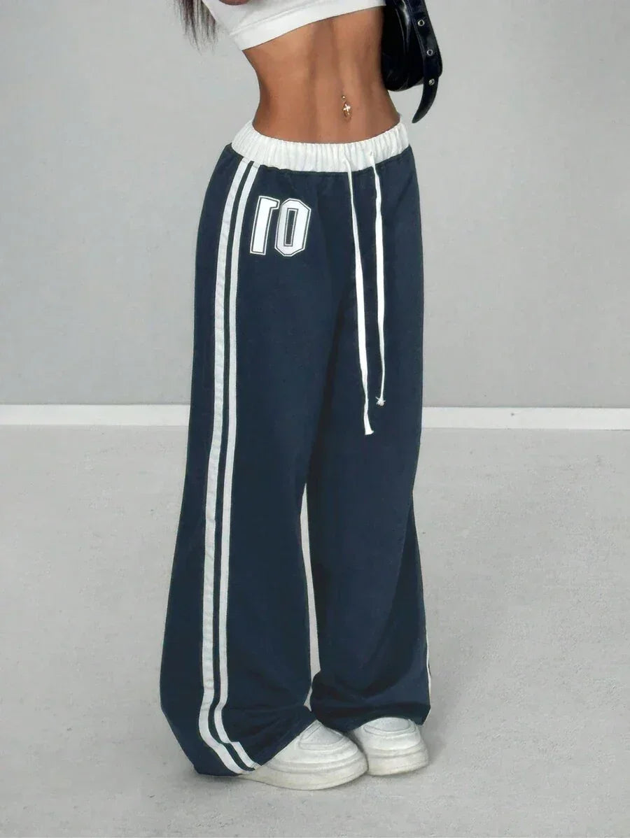 Navy blue cotton HUSTLE801 01 baggy sweatpants with white stripes and drawstring waist
