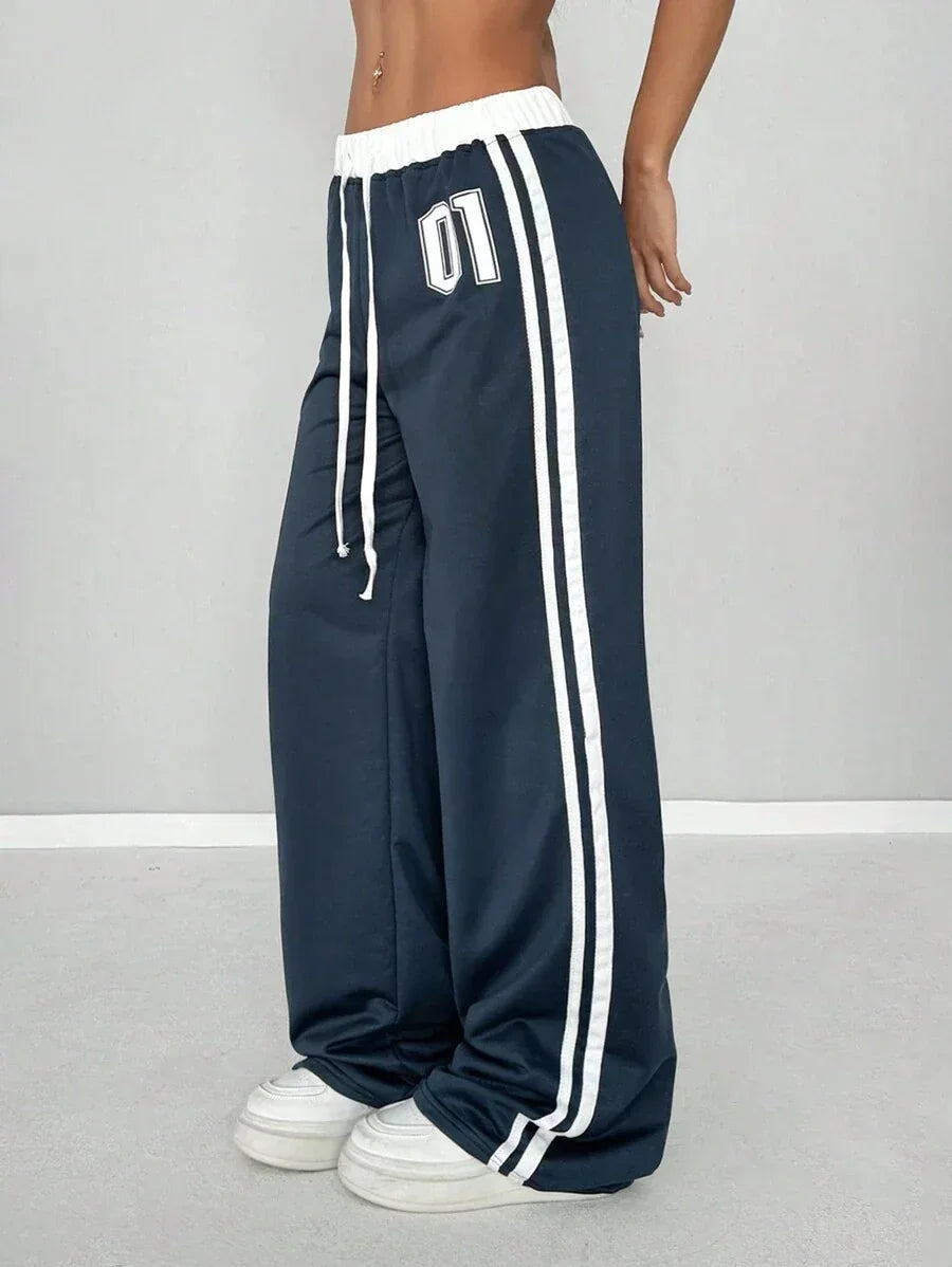 Navy blue HUSTLE801 01 baggy sweatpants in cotton with white stripes and drawstring waistband