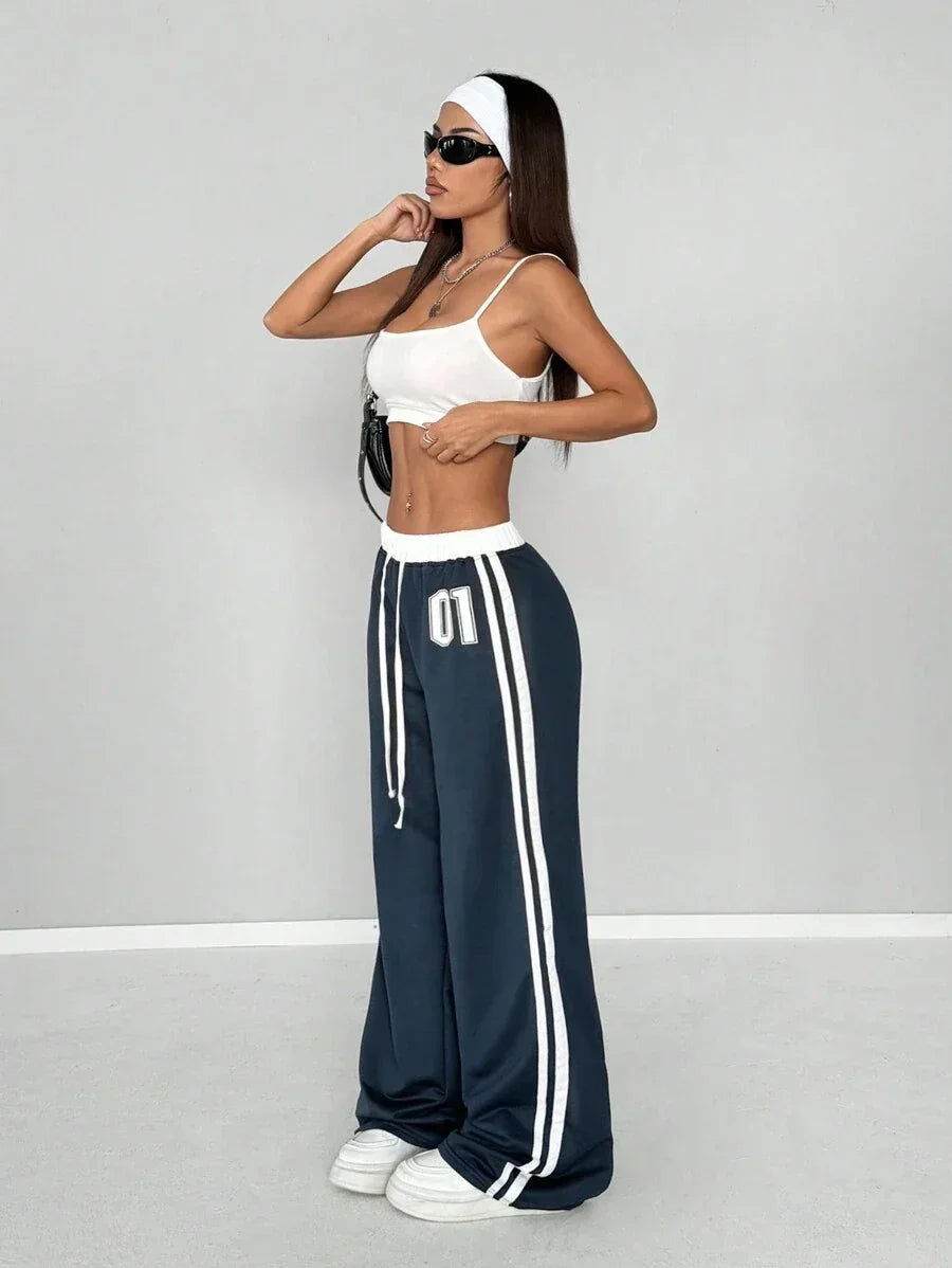 HUSTLE801 01 navy cotton wide-leg sweatpants with white stripes and elastic waistband