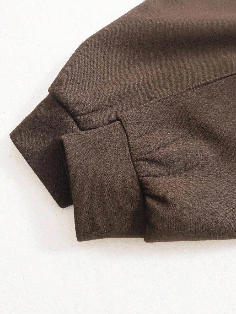 Brown cotton sleeve cuff detail of HUSTLE801 That Girl beanie-inspired top