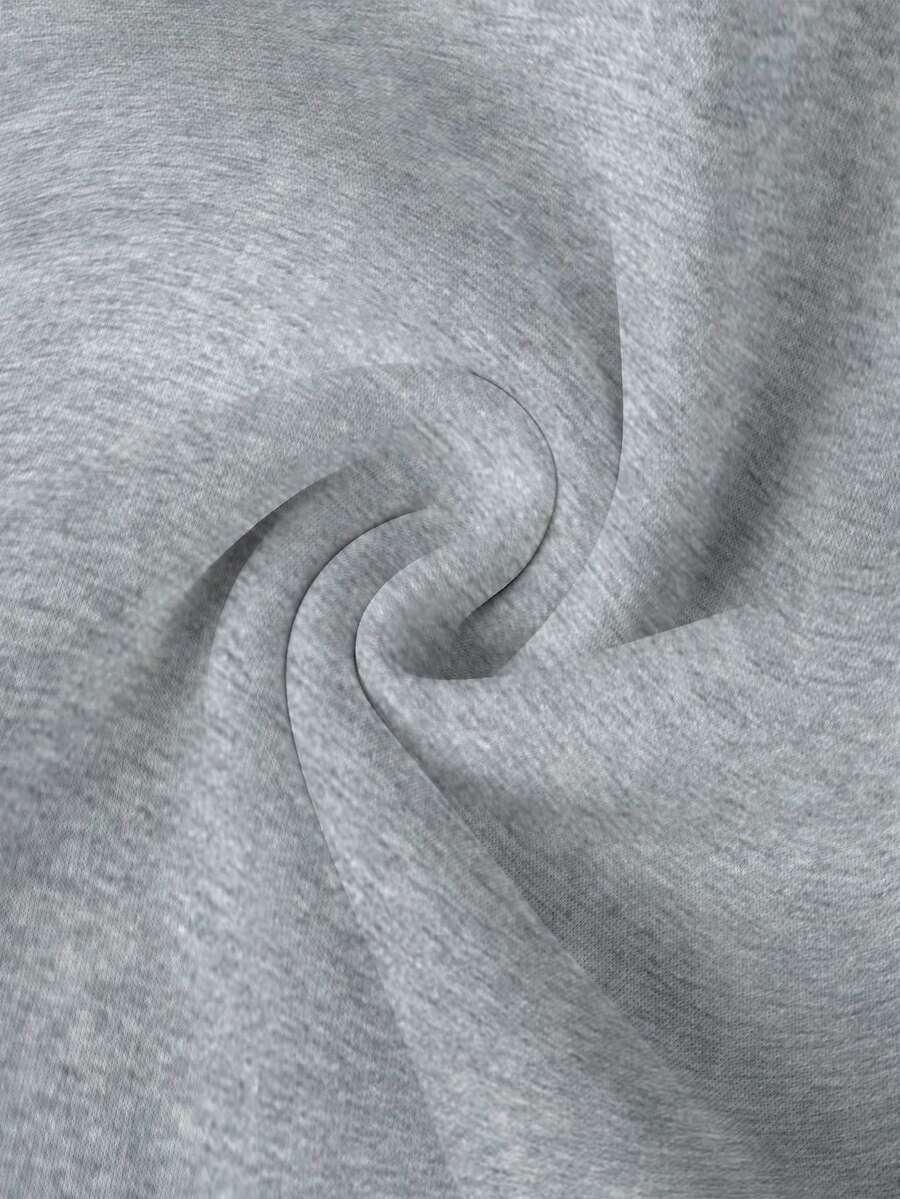 Heather gray cotton fabric from HUSTLE801, soft texture, close-up material detail