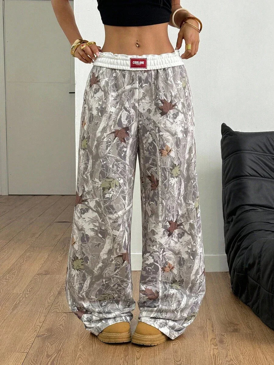 COOLANE camo print baggy cotton pants in gray and white woodland pattern, elastic waist, streetwear style