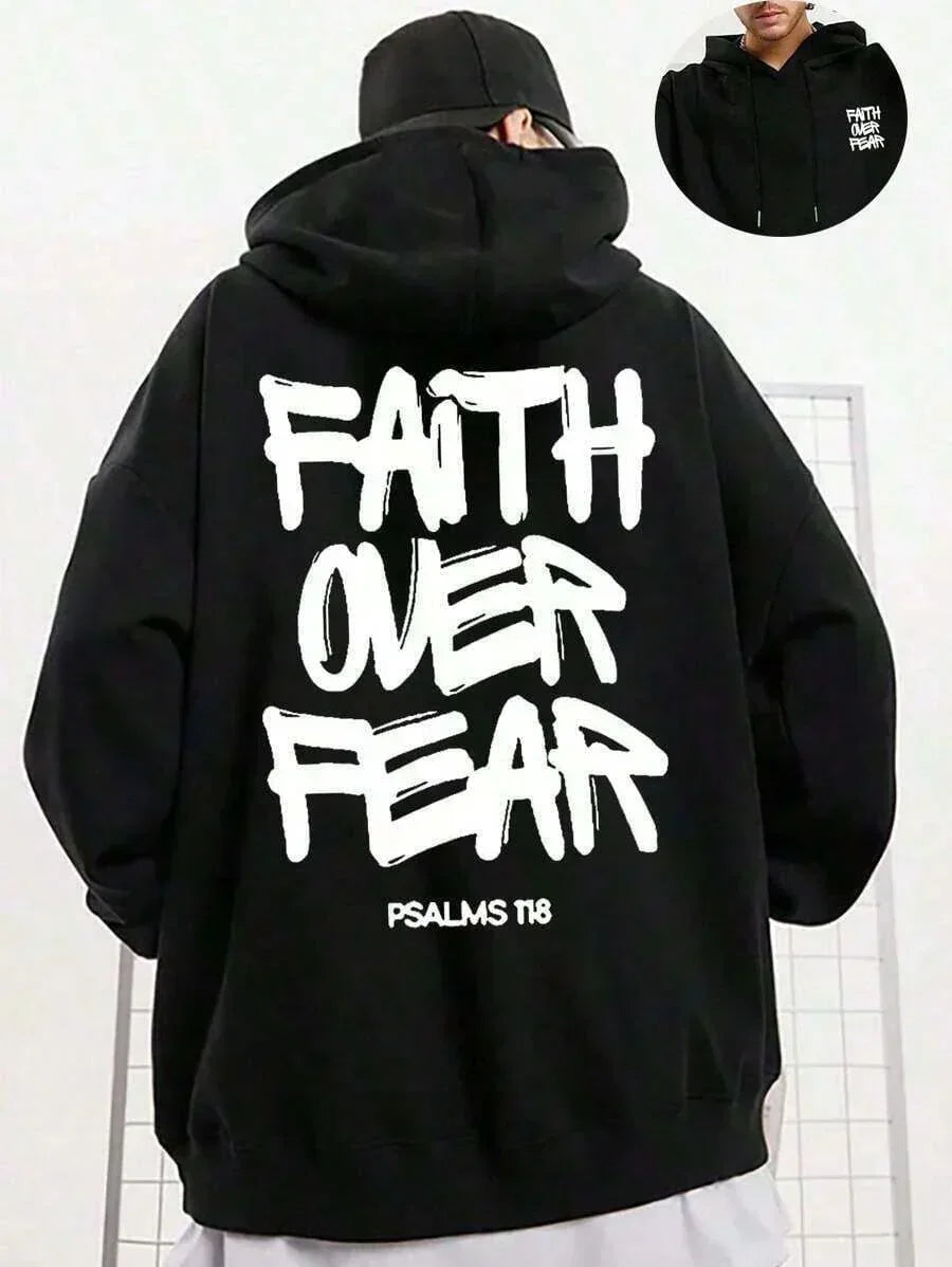 Black cotton Faith Over Fear Psalm 118 hoodie with bold white lettering, relaxed fit, streetwear style