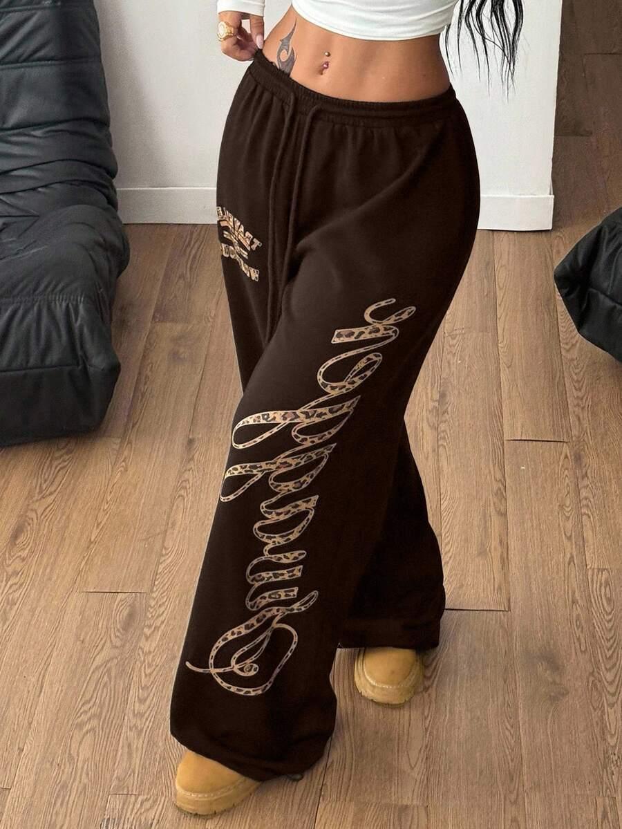 Brown cotton Baddie sweatpants with leopard print script by HUSTLE801, relaxed fit, casual style