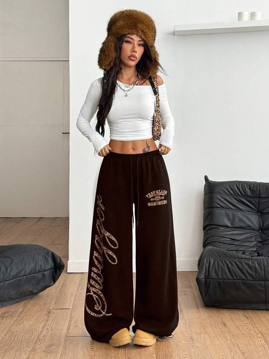 Swagger brown cotton wide-leg sweatpants with leopard print detail, cozy streetwear style