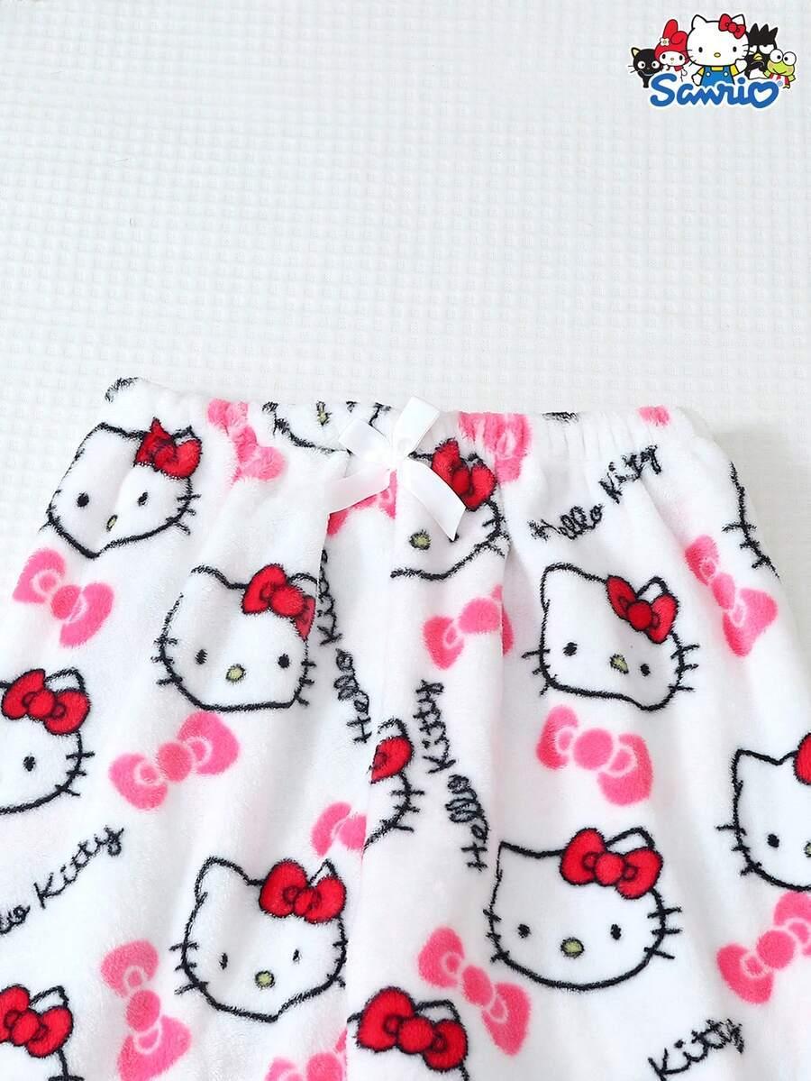 Hello Kitty pajama pants white fleece with pink bows and red accents, Sanrio design, cotton blend