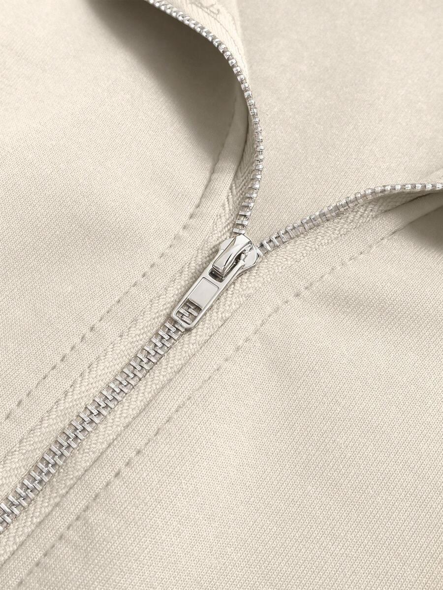 Beige cotton fabric hoodie close-up with silver zipper from HUSTLE801 That Girl collection