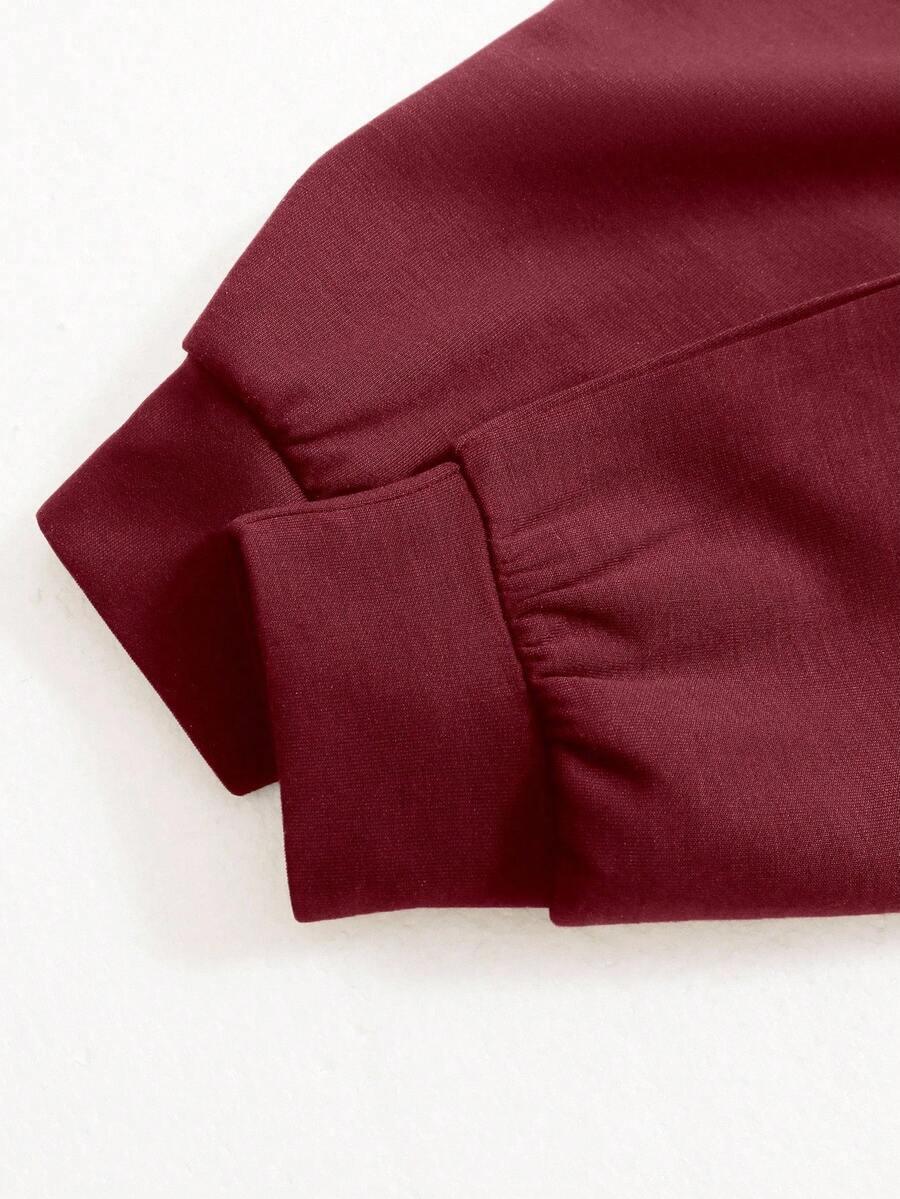 Maroon cotton sleeve detail of HUSTLE801 That Girl beanie, close-up on cuff for fabric texture