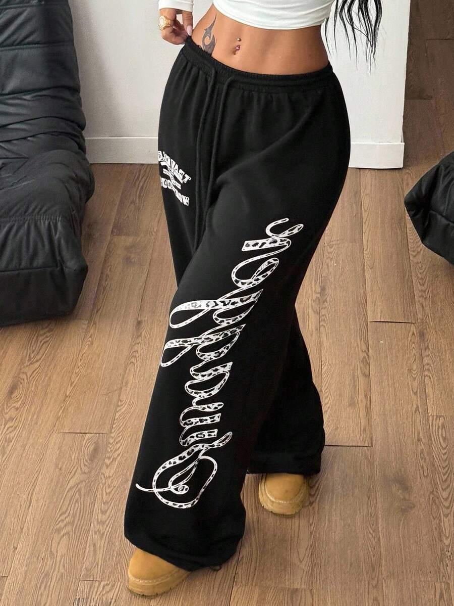 Black cotton baggy sweatpants with bold white graphic lettering, HUSTLE801 Grateful Pants