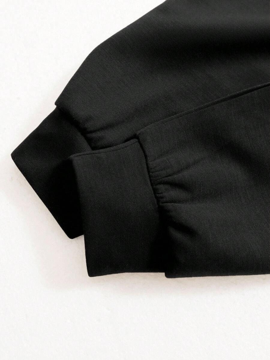 Black cotton cuff detail on HUSTLE801 That Girl beanie sleeve, minimalist close-up