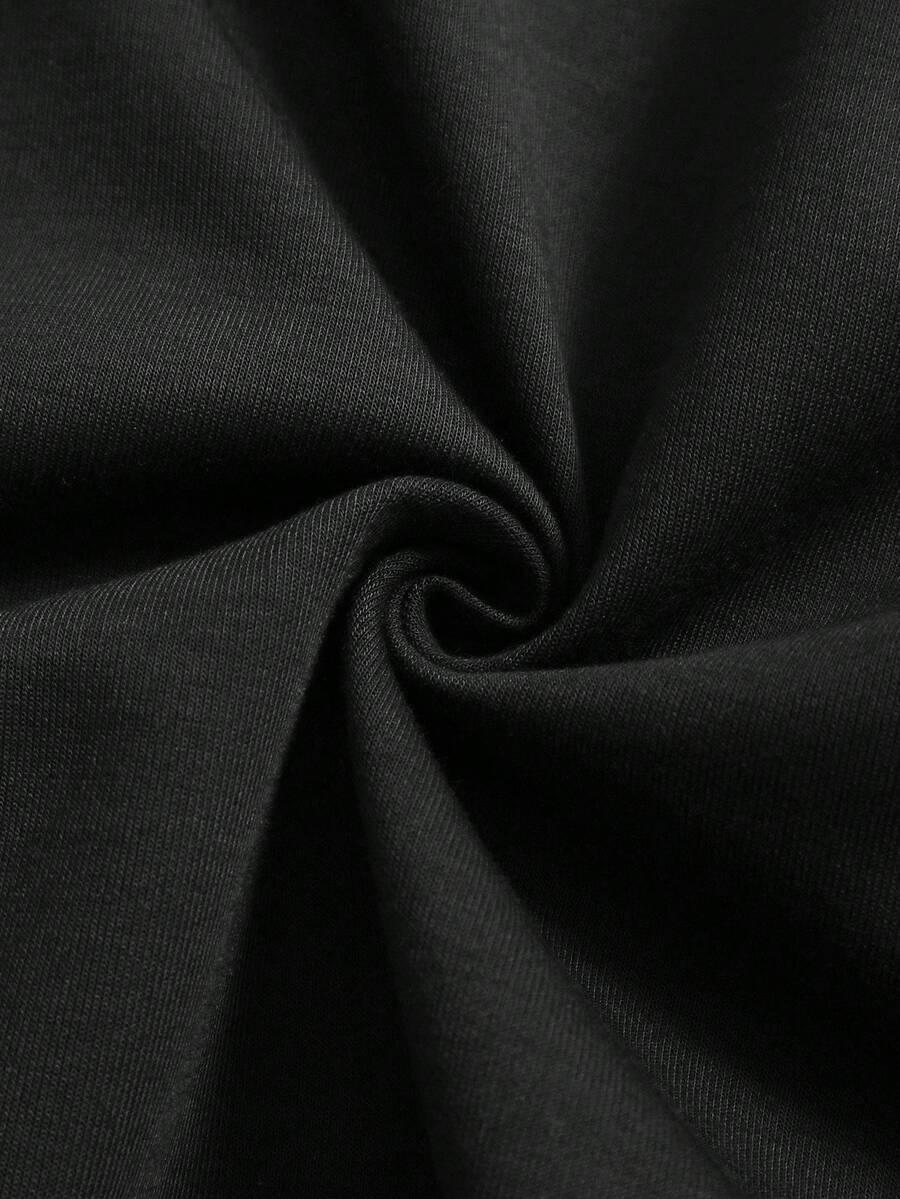 HUSTLE801 That Girl beanie in black cotton, close-up of soft knit fabric texture