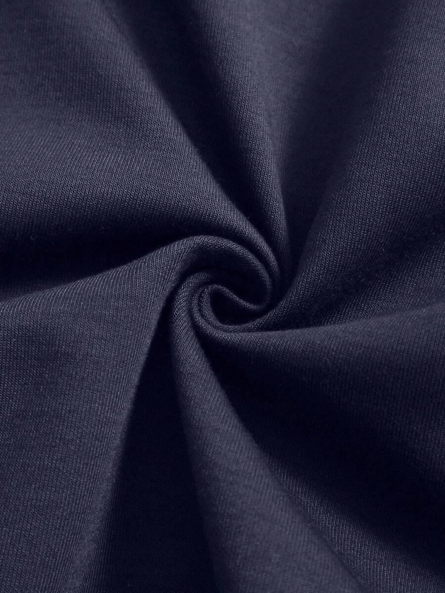 HUSTLE801 navy cotton fabric close-up, soft and smooth material texture for That Girl beanie