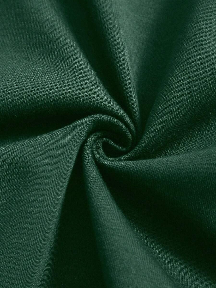 Dark green cotton fabric close-up with smooth texture, HUSTLE801 That Girl beanie material