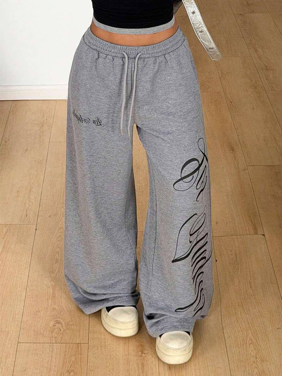 Gray cotton baggy sweatpants with black graphic script, elastic waistband, HUSTLE801 Streetwear Pants