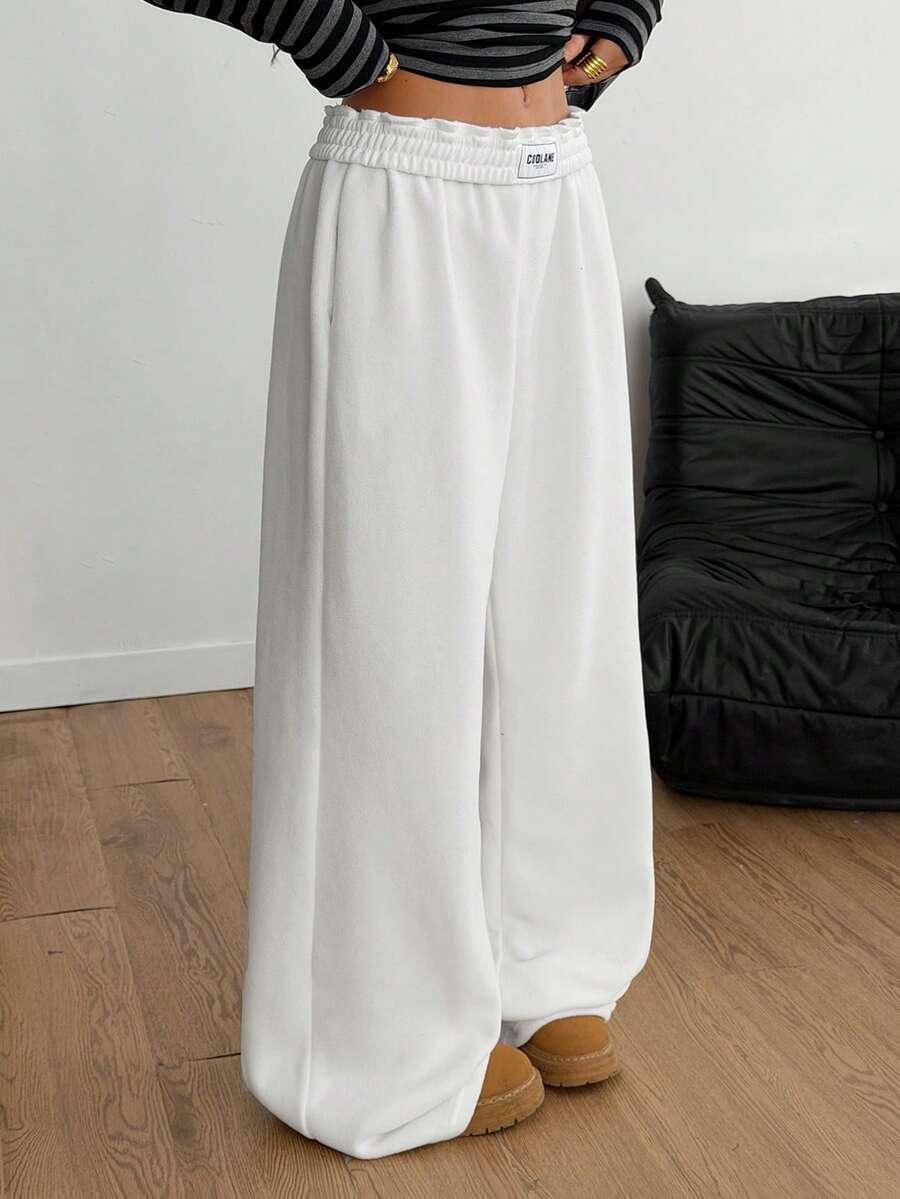 White cotton wide-leg sweatpants with elastic waistband, CIBLANK label, casual streetwear