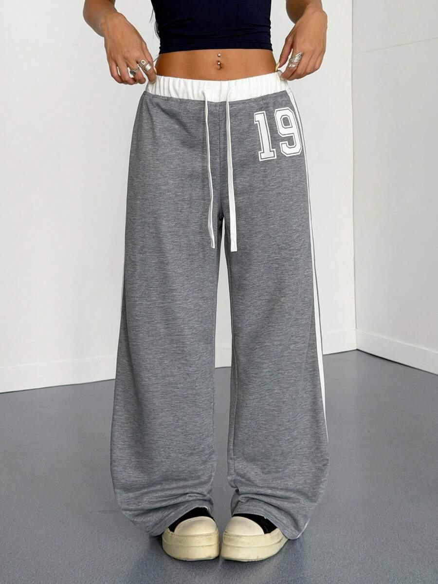 Gray cotton HUSTLE801 19 Sweatpants with white drawstring and sporty number 19 print, baggy fit