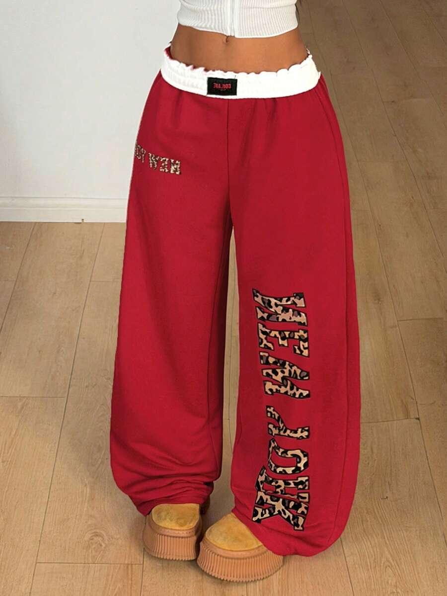 HUSTLE801 HEAVYWEIGHT red cotton sweatpants with leopard print lettering and elastic waistband