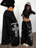 Black cotton baggy cross-print pants SIMPLE by HUSTLE801, wide leg streetwear style
