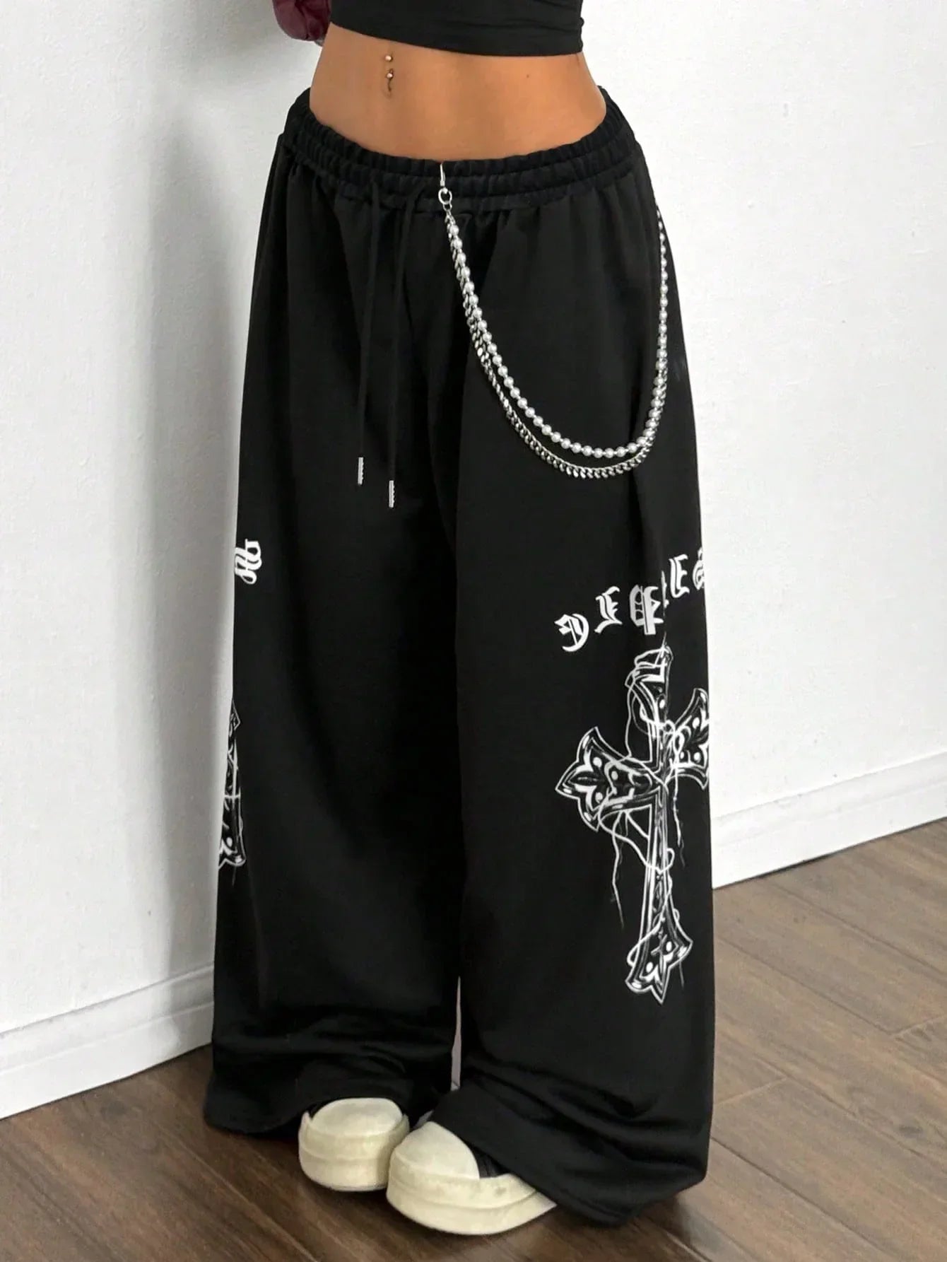 Black cotton baggy pants with a chain and white cross graphic, HUSTLE801 Cross Chain Pants