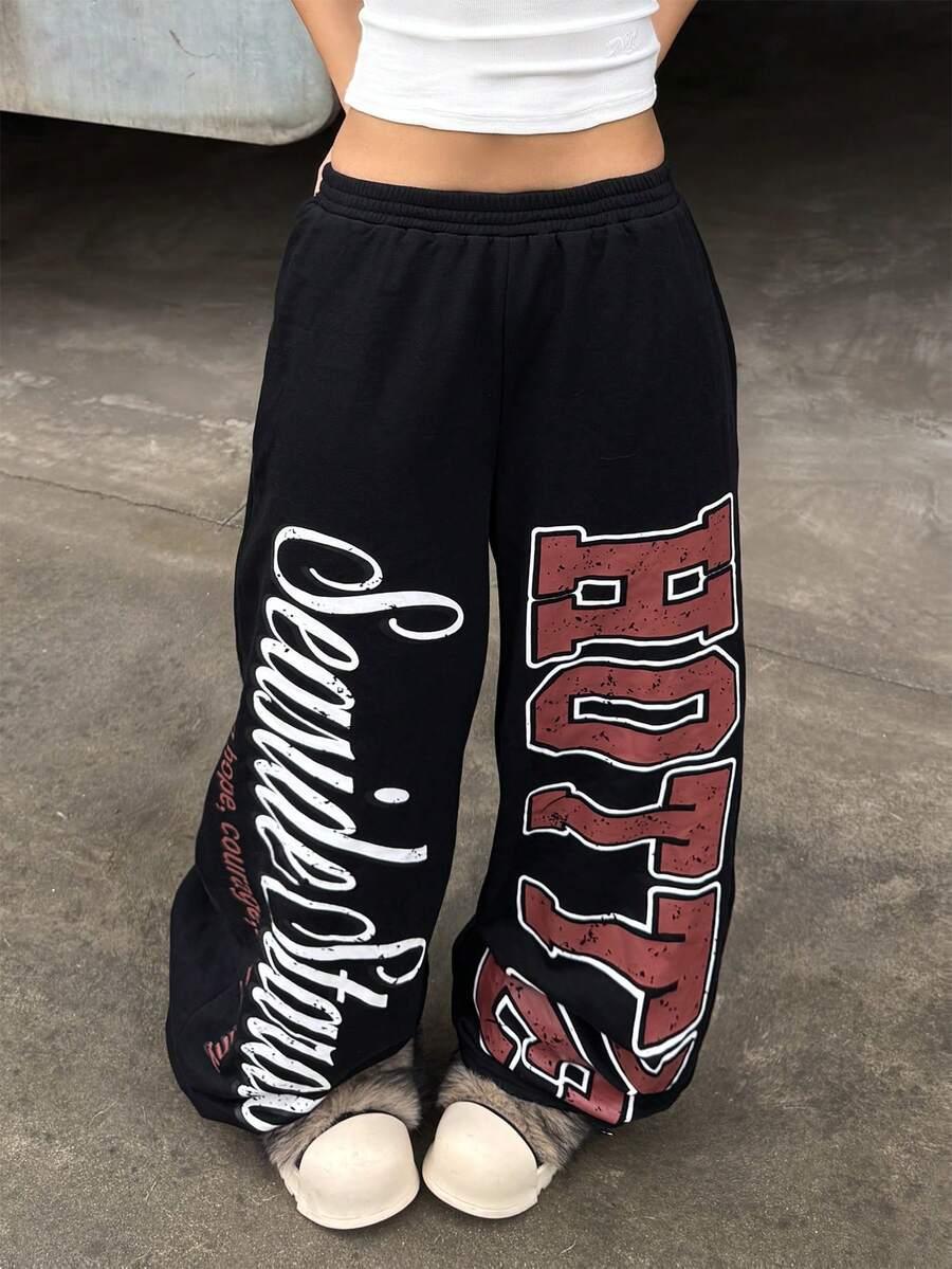Black cotton 801 letter print sweatpants from HUSTLE801 with bold white and red graphics