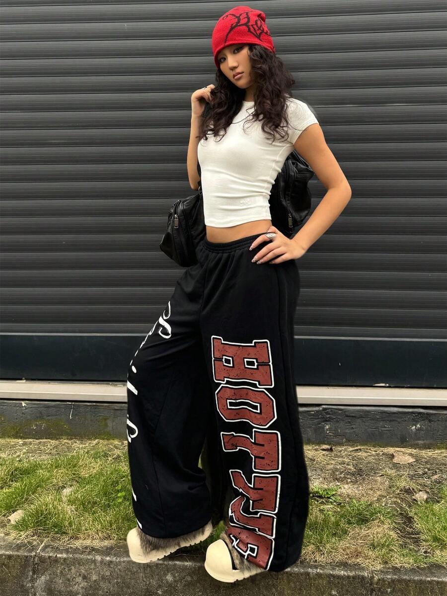 HUSTLE801 That Girl red knit beanie, cotton crop tee, and black HOTSHOT baggy sweatpants outfit
