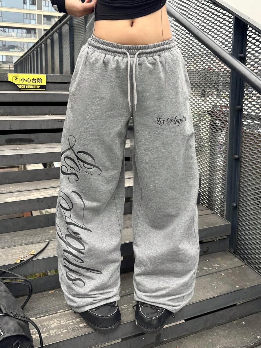 Los Angeles grey cotton baggy sweatpants with black script, streetwear style by HUSTLE801