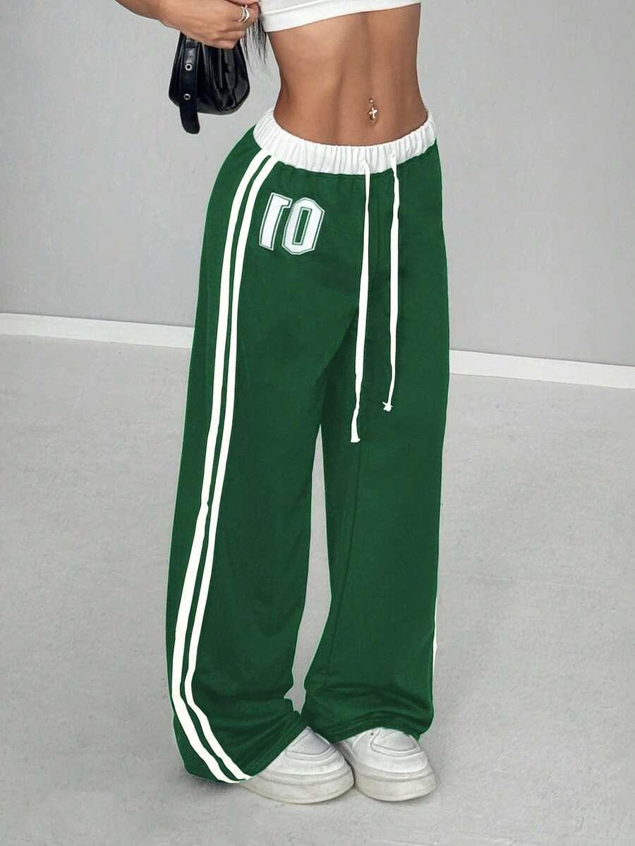 Green cotton HUSTLE801 01 baggy sweatpants with white stripes and elastic waist, streetwear style