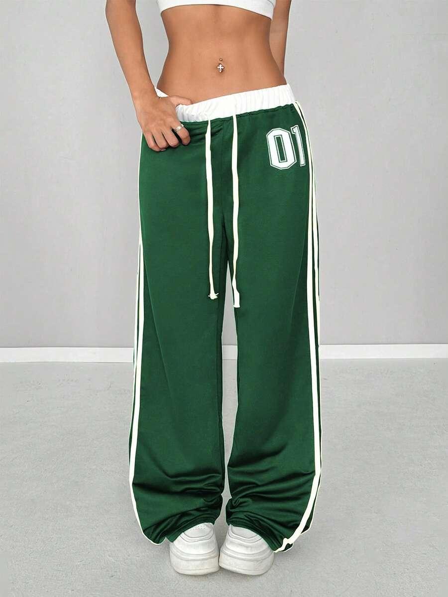 Green cotton HUSTLE801 01 Baggy Pants with white stripes and elastic waist, sporty streetwear style