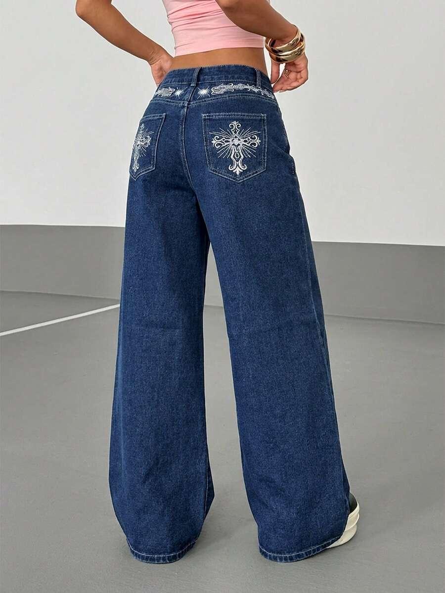 Dark blue wide leg jeans with white embroidered back pockets, cotton material, street style
